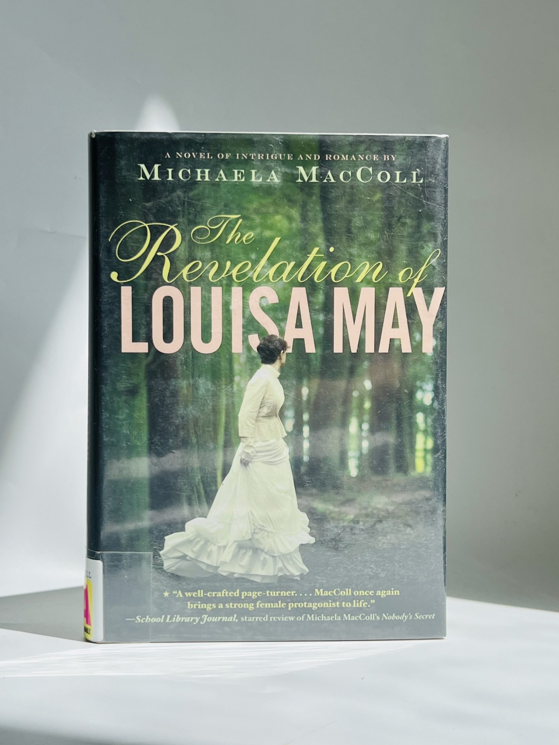 Michaela Maccoll _ The Revelation Of Louisa May - Nhà Sách Kim Tây Nguyên